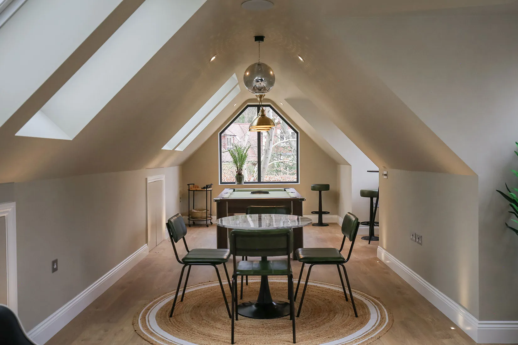 a room with a table and chairs in it